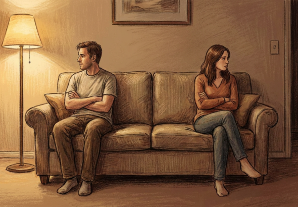 Couple sitting apart on a couch looking away from each other